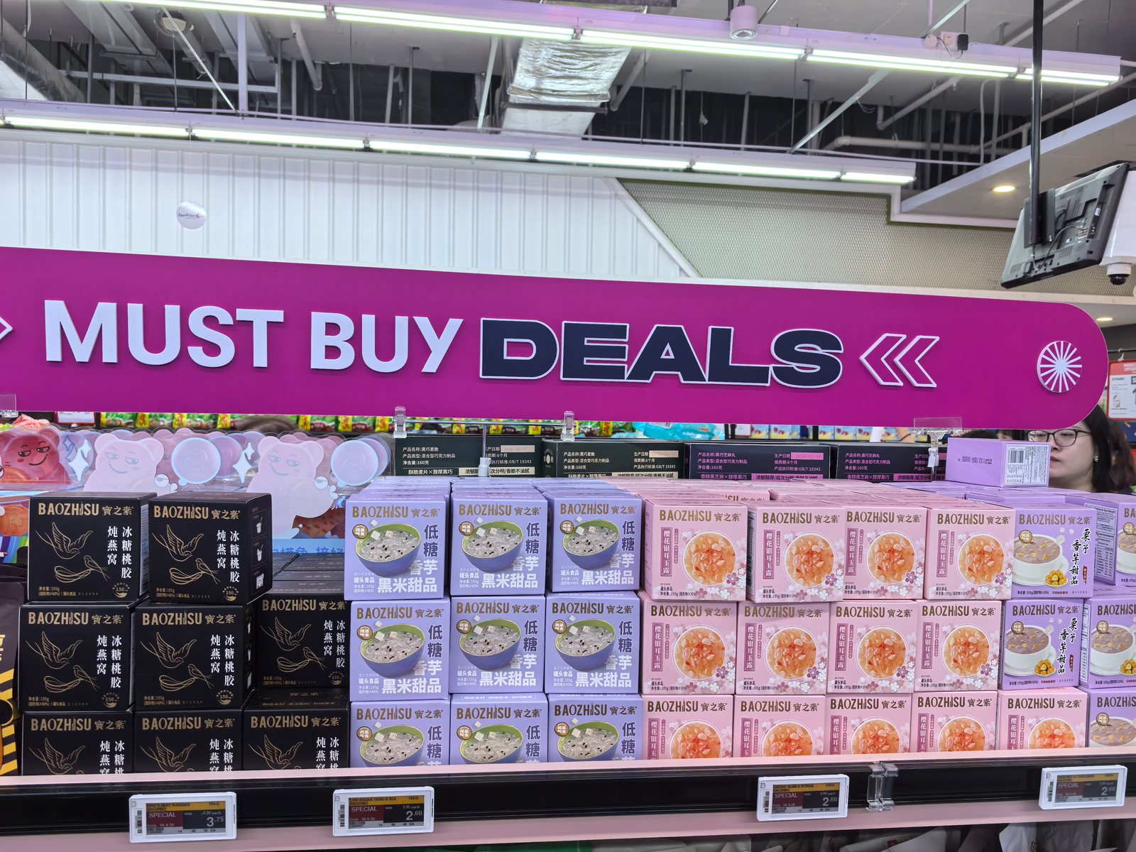 Baozhisu desserts in a FairPrice promotional display in Singapore